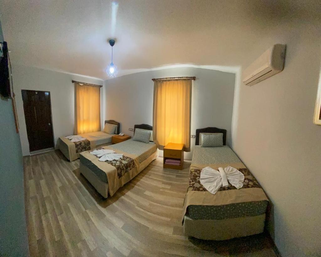 Tan Otel 梅尔辛 外观 照片